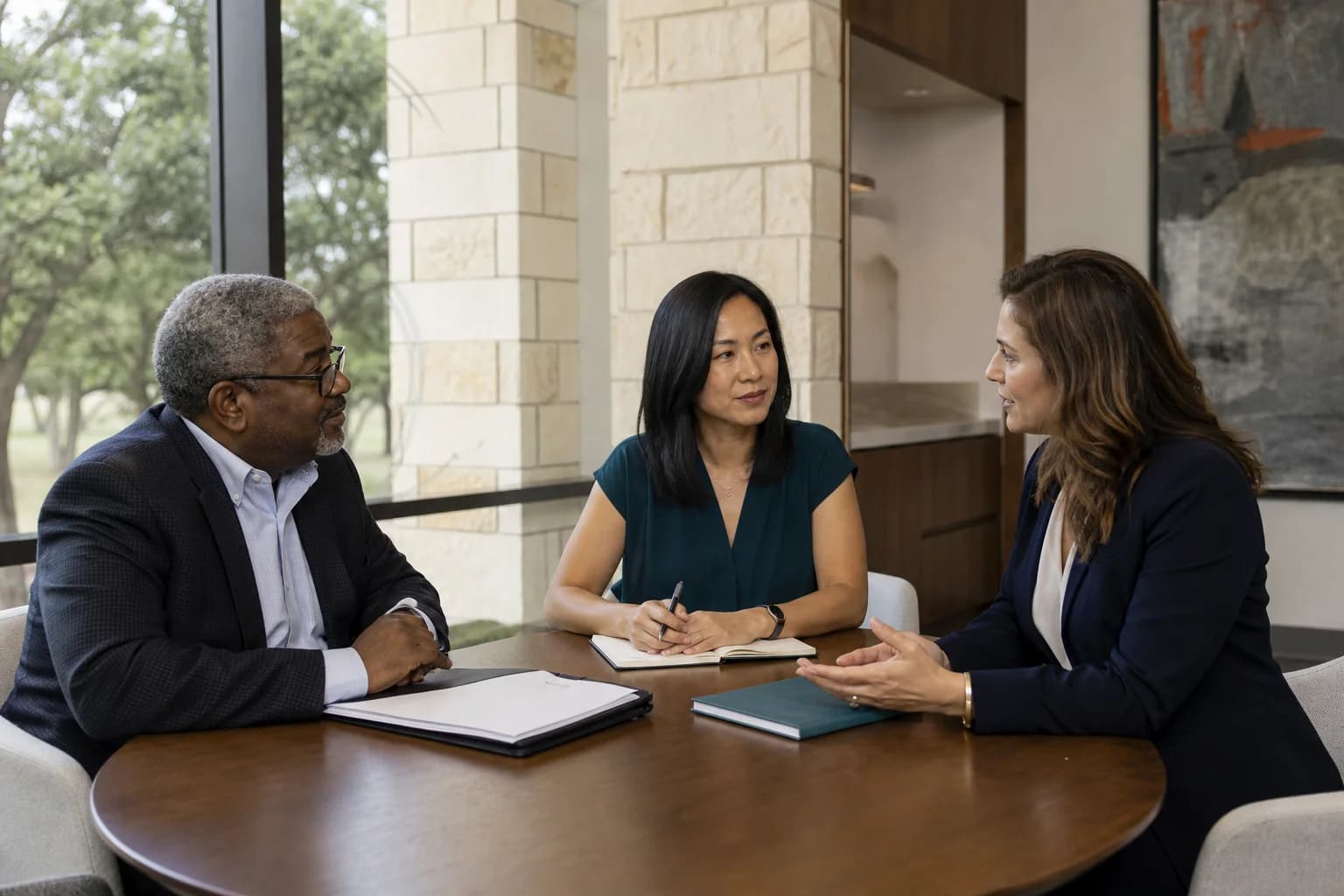 Oncology leaders interviewing a physician candidate